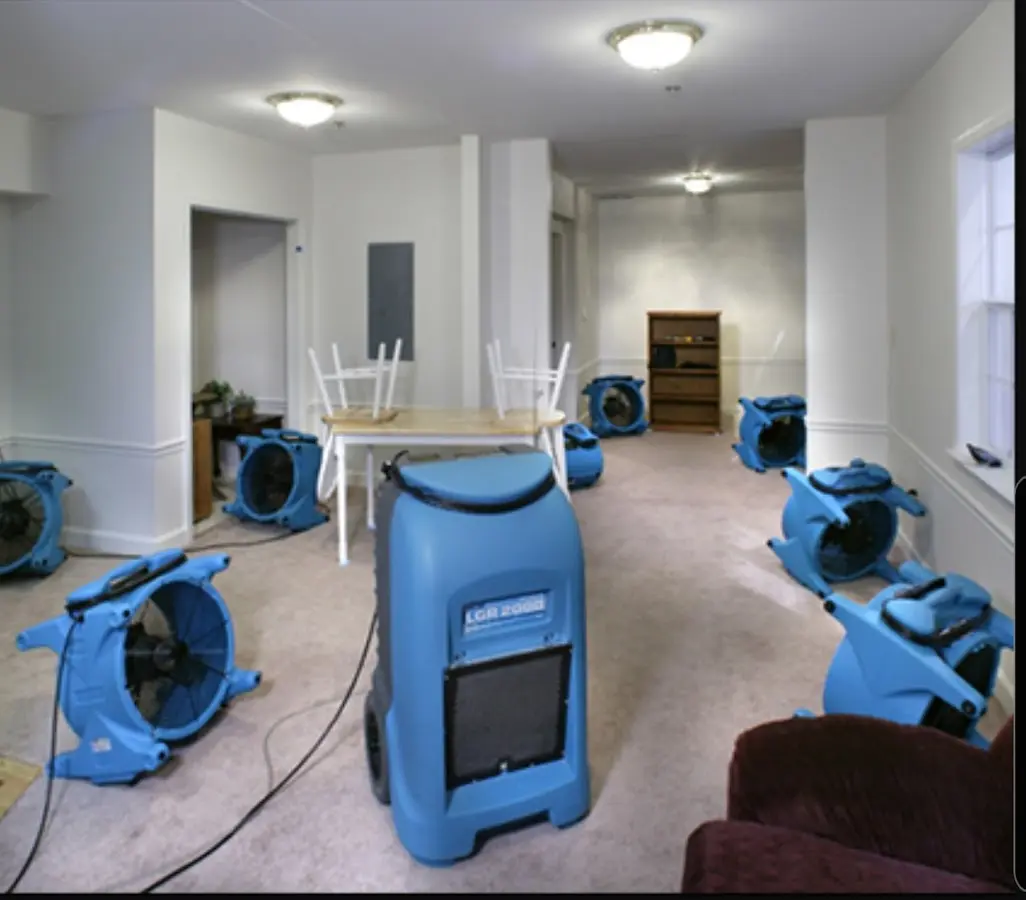 Air movers and dehumidifier setup for Water Damage Restoration in La Grande